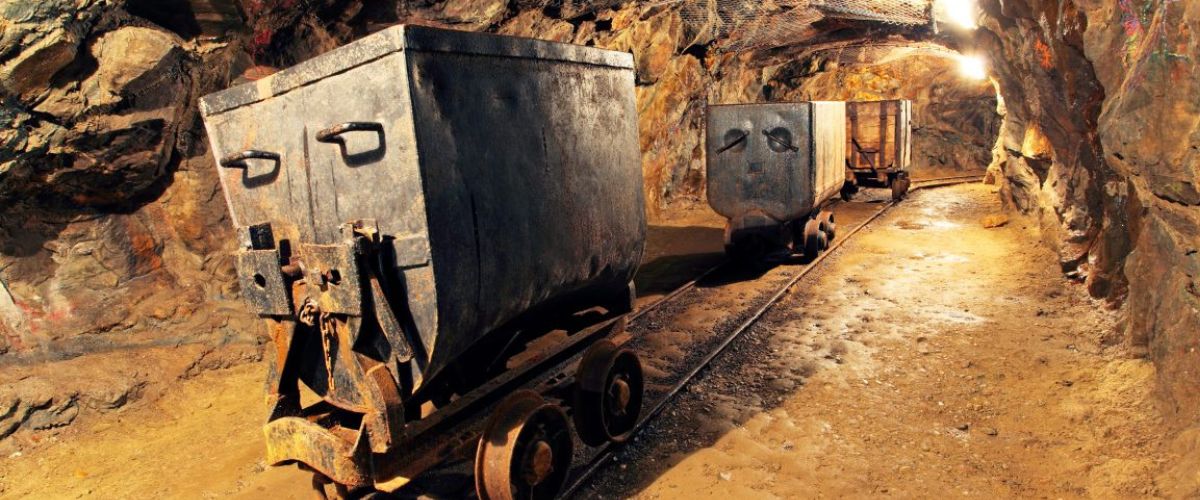 A photo of mining carts underground